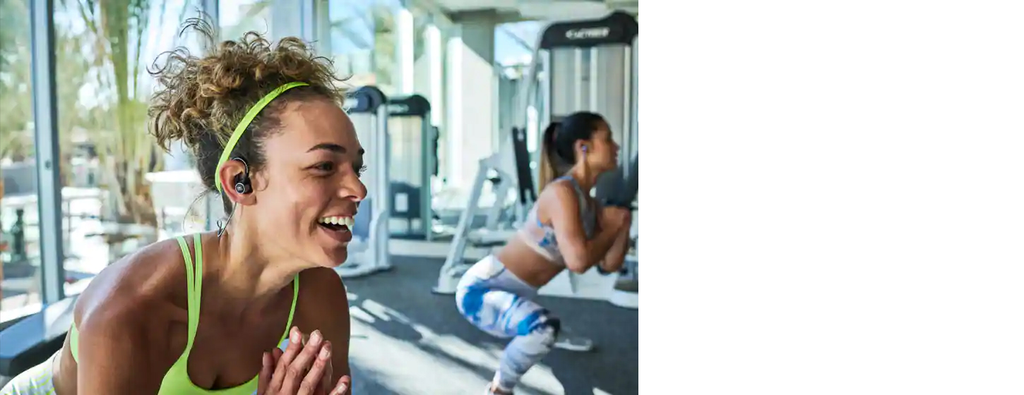 A girl wears JBL Reflect Contour 2 Secure fit Wireless Sport Headphones