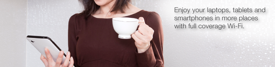 A woman with a tablet and cup of tea, along with text that reads: Enjoy your laptops, tablets and smartphones in more places with full-coverage Wi-Fi
