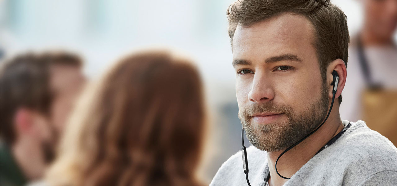 The Jabra Elite 65e worn by a man
