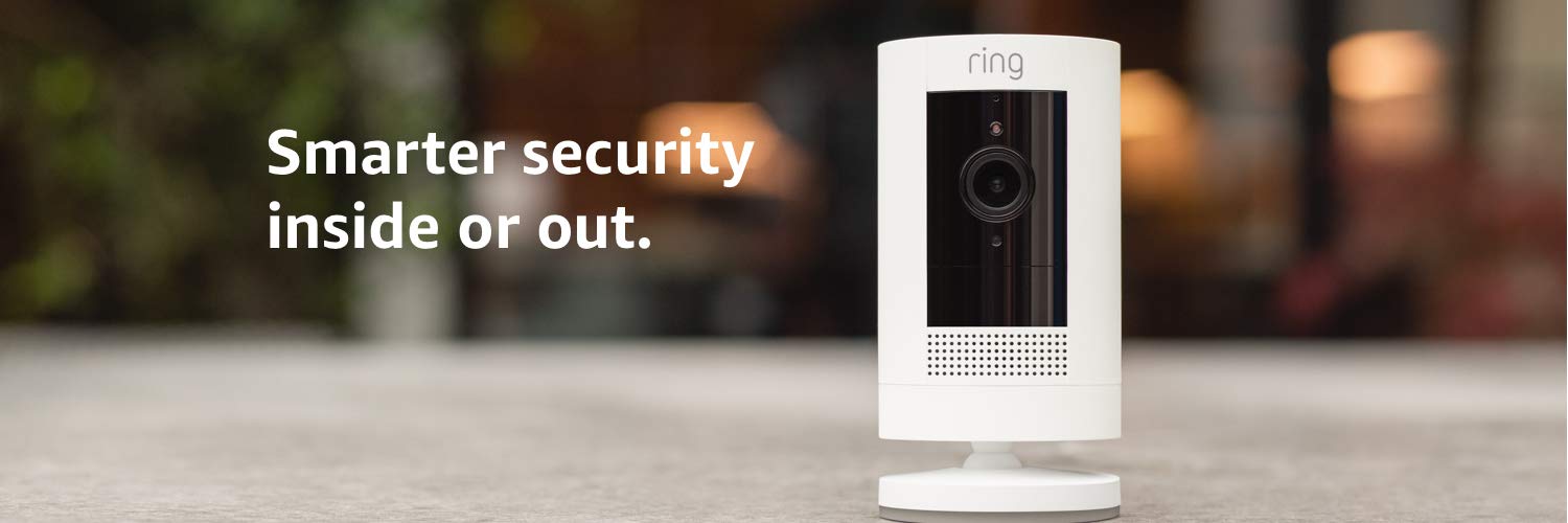 The front view of the Stick Up Cam Battery in standing position, with texts reading as “smarter security” and “inside and out.” on the left