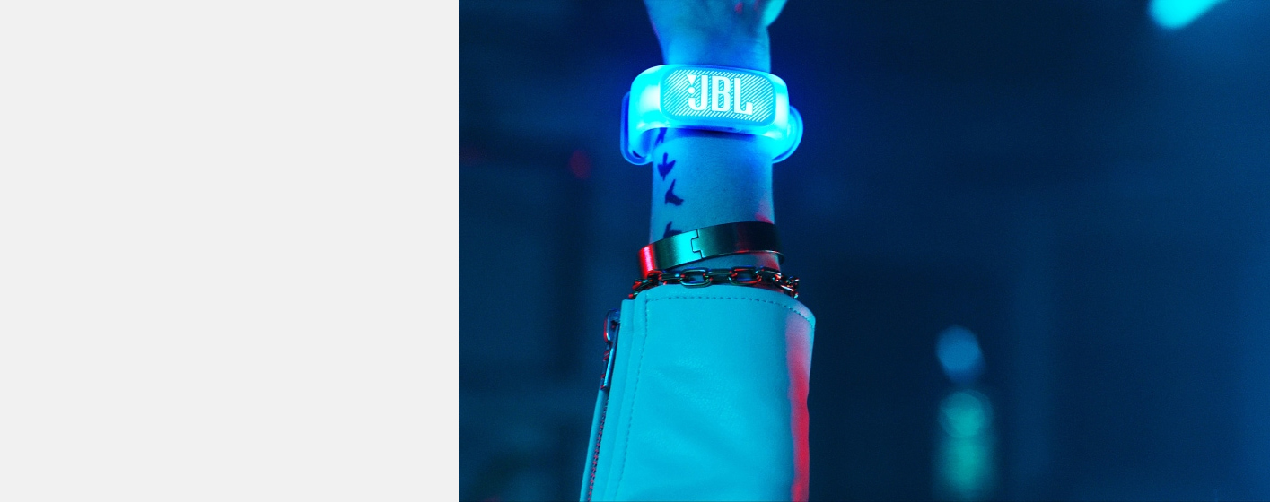 JBL PartyBox 1000 Premium High Power Wireless Bluetooth Audio System is worn on the wrist