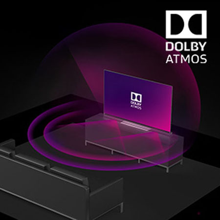 a TV with Dolby Atmos placed in front of a sofa