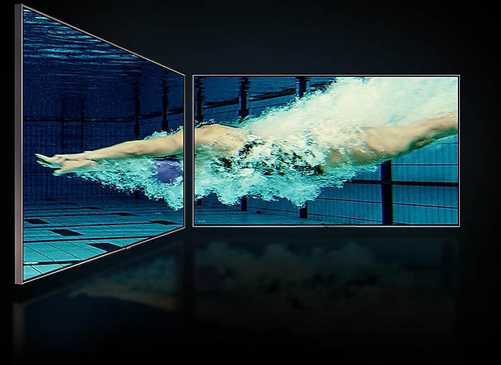 Two SAMSUNG displays angled towards each other sharing an image of swimmer diving underwater in a pool