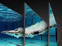 Underwater image of a swimmer diving into a pool