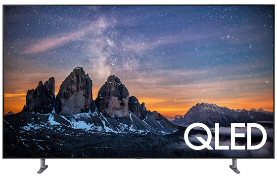 SAMSUNG Q80R Facing Forward with Mountain Rock Formations at sunset with stars in a dark blue sky