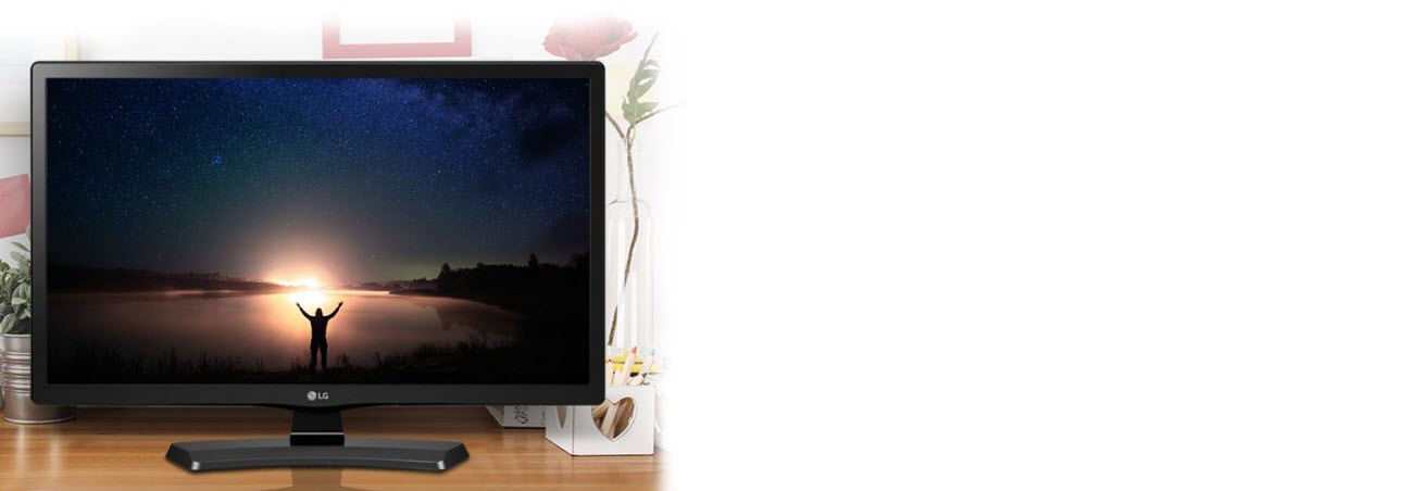 LG LJ4540 TV showing a man wathcing a sunrise