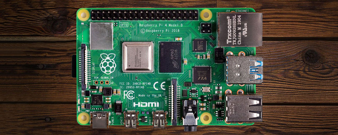 Top view of the Raspberry Pi 4 board placed on a wood surface