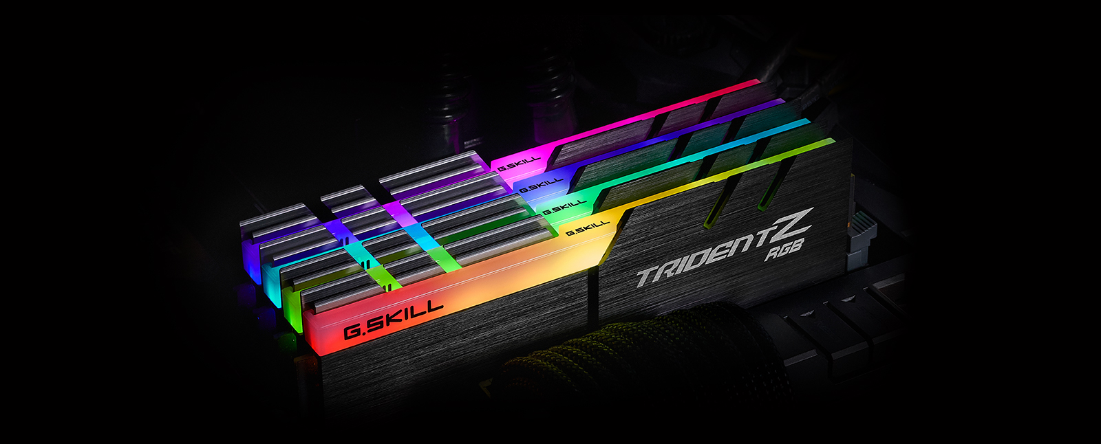 four tridentz rgb ddr4 memory installed on a motherboard, angled down to the right