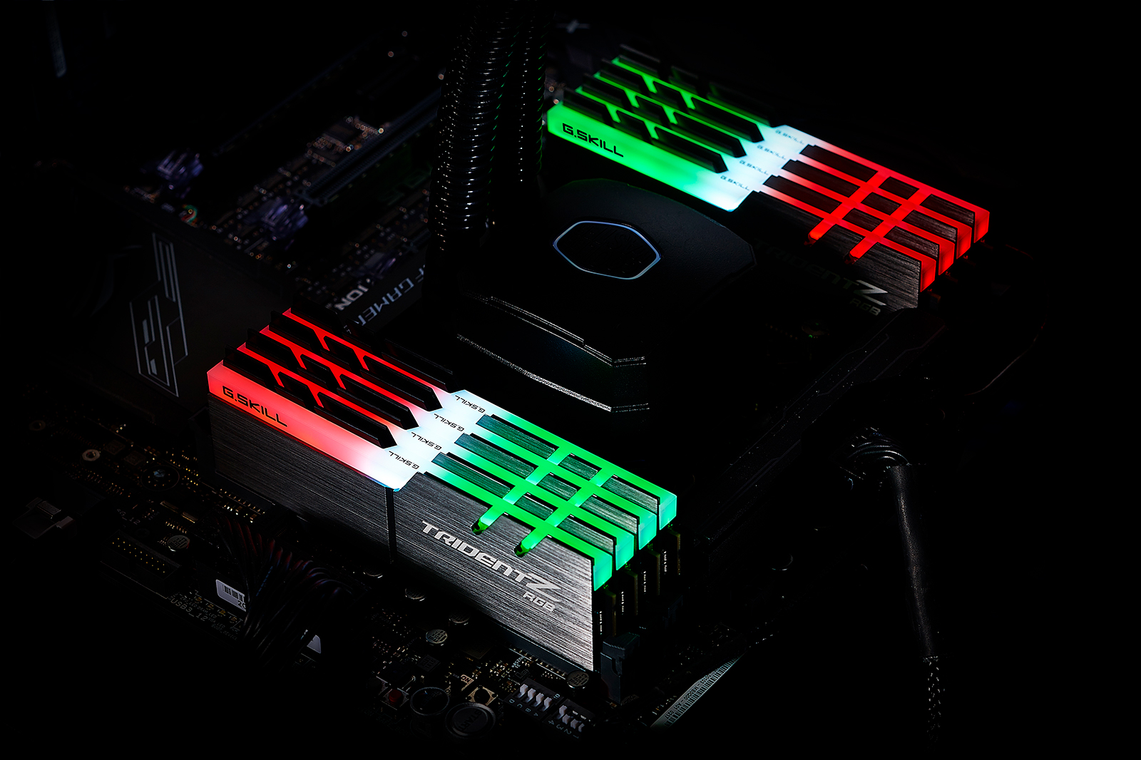 Two Sets of Four G.Skill TridentZ RGB Memory Modules Installed on a Motherboard