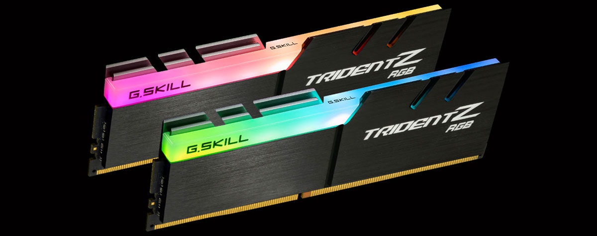 Front view of two Trident Z modules in standing position, facing slightly to the right, each glowing different colors on the RGB strip