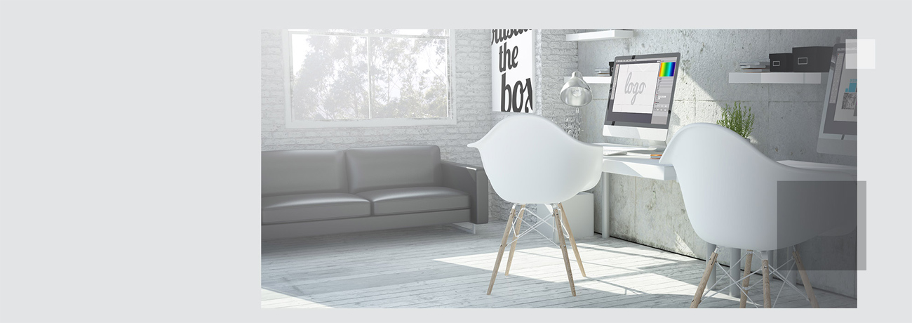 A white-washed image of a desk with an all-in-one desktop PC