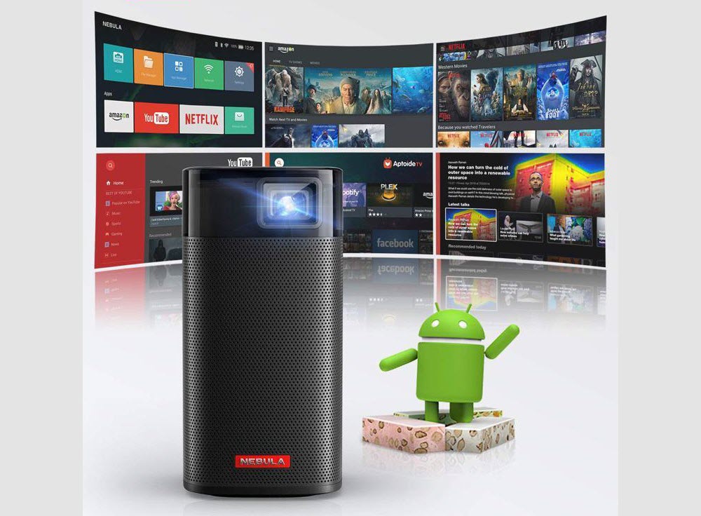 Nebula Apollo projector in front of a large screen beside an Android robot