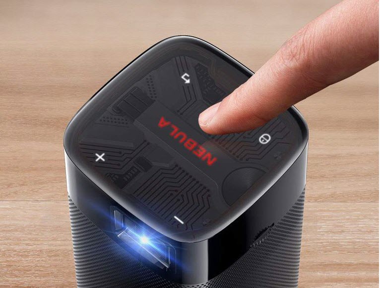 a finger touching buttons on Nebula Apollo projector