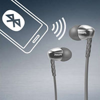 Two ear pieces on the right part of this picture, with a sketch of phone on the left part with a Bluetooth logo on its screen. Between the phone and earphones is a wireless symbol