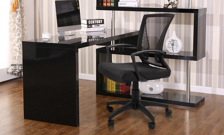 A chair is slightly tilted to the left in an office.