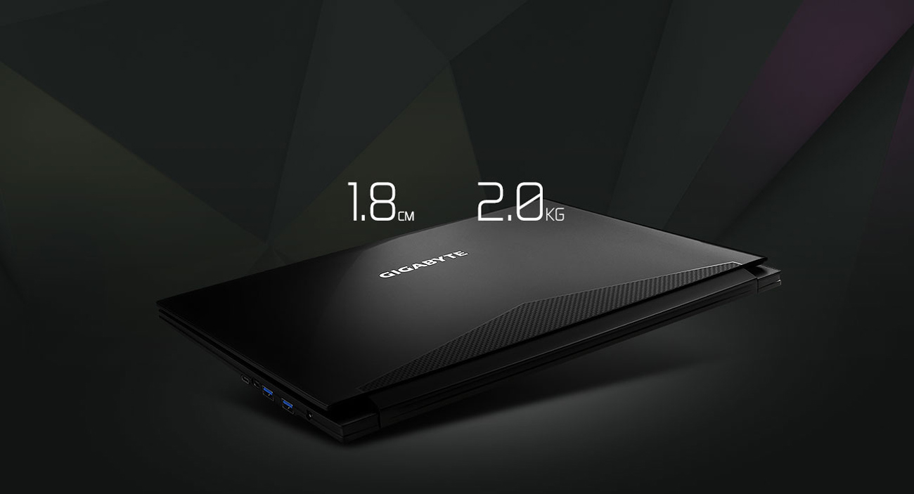 the laptop in a dark background