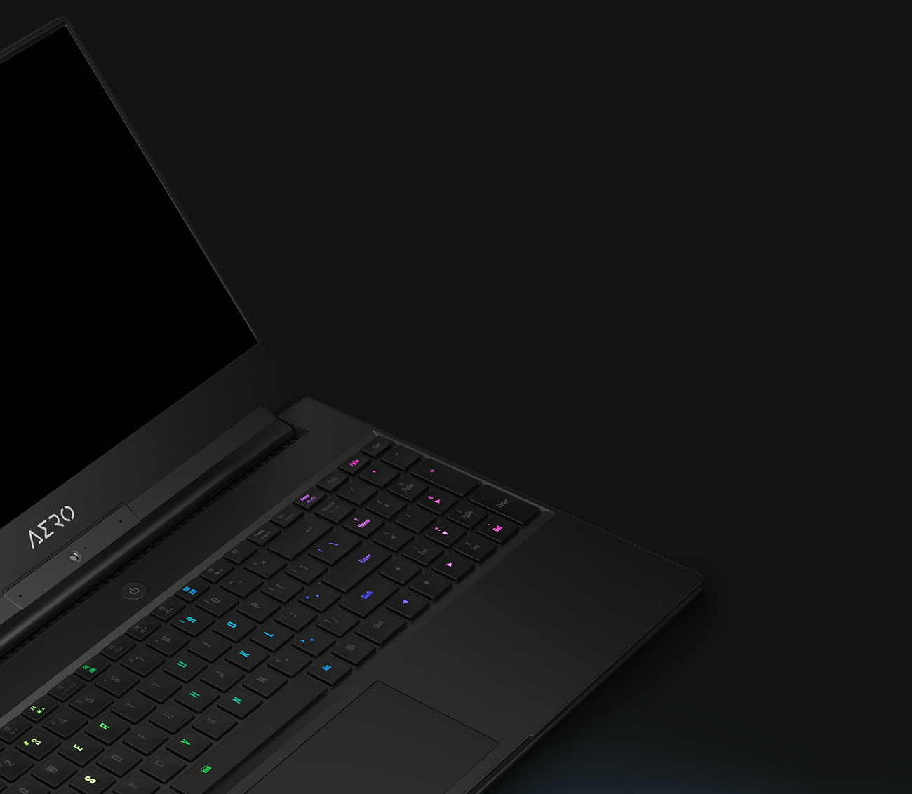 the laptop in a dark background