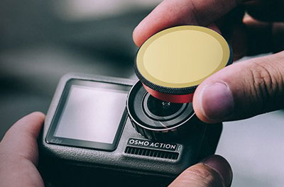 A filter being attached to the action camera