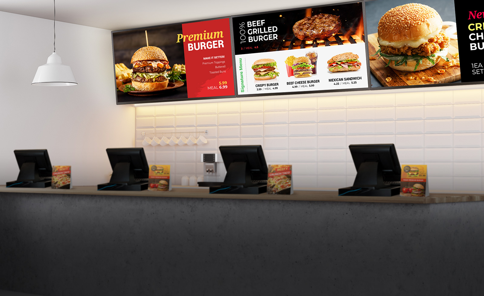 LG commercial displays at a fast-food burger restaurant behind the point of sale kiosks