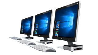 three monitors with three Intel NUCs
