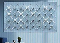 A modern light art installation on a home wall