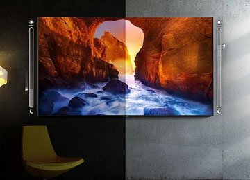 Split image showing a mounted TV on a wall next to a yellow chair. The TV shows a river running through a canyon