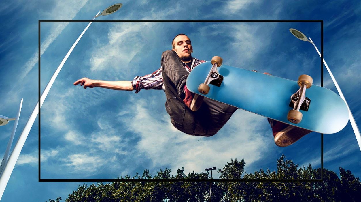 Samsung Q70R blending with an image of a male skateboarder doing an ollie over the viewer