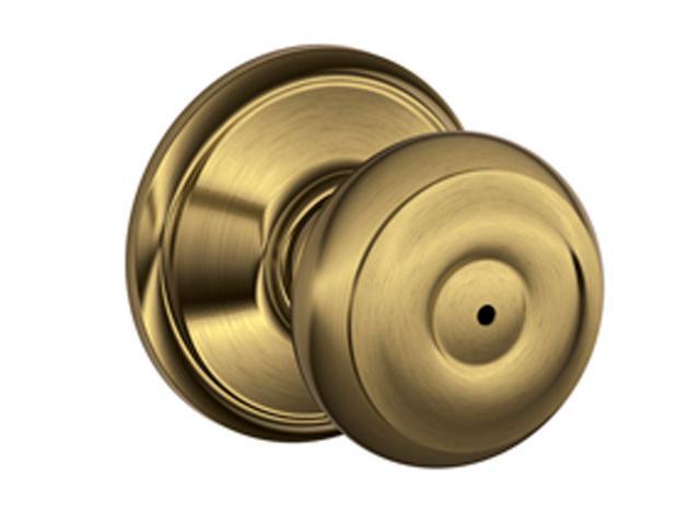 Schlage F40GEO609 Georgian Bed and Bath Knob in Antique Brass