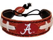 Support your team by wearing a classic team football bracelet! This handmade bracelet is made of genuine football leather. The bracelet also features a ceramic football bead and elastic loops for closure. There are two loops for adjustable sizing, maki