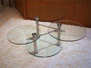 Alice Coffee Table A3120-CM-CG Chrome legsMotion round coffee table with three clear glass shelveslength:DIA 28height:17style:Contemporarymaterial:Glass Type: Arm Chairs Color/Finish: As Shown Color Mapping: Beige Style: Casual Material: Leather Gender: Male