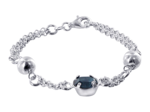 .925 Sterling Silver Dual Chain with 7mm Ball and 10 x 9mm Oval Blue Cubic Zirconia 6.5" Bracelet with Lobster Clasp .925 Sterling Silver Dual Chain with 7mm Ball and 10 x 9mm Oval Blue Cubic Zirconia 6.5" Bracelet with Lobster Clasp