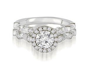 1.04 cttw. Halo Round Cut Diamond Bridal Set in Platinum (VS2, G-H) 1.04 cttw. Halo Round Cut Diamond Bridal Set in Platinum (VS2, G-H)