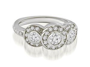1.07 cttw. Halo Three Stone Round Cut Diamond Engagement Ring in 18K White Gold (VS2, G-H) 1.07 cttw. Halo Three Stone Round Cut Diamond Engagement Ring in 18K White Gold (VS2, G-H)