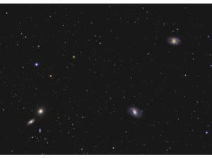 Leo I galaxy cluster showing Messier 95, Messier 96, and Messier 105 Poster Print (32 x 23) Leo I galaxy cluster showing Messier 95, Messier 96, and Messier 105 Poster Print (32 x 23)