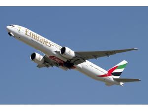 An Emirates Boeing 777-200 airliner Poster Print (34 x 23) An Emirates Boeing 777-200 airliner Poster Print (34 x 23)