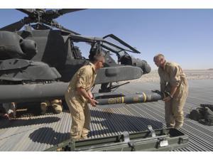 Aircrew loading an AGM-114 Hellfire missile onto an Apache helicopter Poster Print (34 x 22) Aircrew loading an AGM-114 Hellfire missile onto an Apache helicopter Poster Print (34 x 22)
