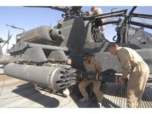 Aircrew loading an AGM-114 Hellfire missile onto an Apache helicopter Poster Print (34 x 22) Aircrew loading an AGM-114 Hellfire missile onto an Apache helicopter Poster Print (34 x 22)
