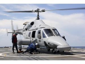 U.S. Sailors chock and chain an Ecuadorian Navy Bell 230 helicopter Poster Print (34 x 22) U.S. Sailors chock and chain an Ecuadorian Navy Bell 230 helicopter Poster Print (34 x 22)