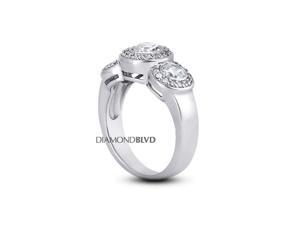 0.98 CTW E-VS2 EX Round Earth Mined Diamonds 18K Bezel & Pave Vintage Halo 3-Stone Ring 7.2gr 0.98 CTW E-VS2 EX Round Earth Mined Diamonds 18K Bezel & Pave Vintage Halo 3-Stone Ring 7.2gr