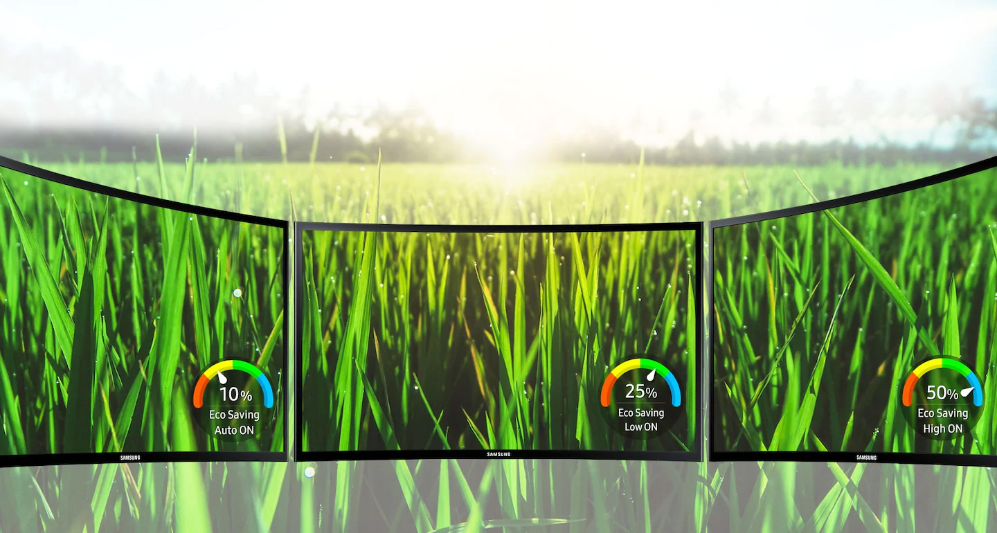 Three Samsung LC27F396FHNXZA monitors next to one another showing the difference in picture quality of blades of grass between 10% eco saving auto on, 25% eco saving low on and 50% eco saving high on