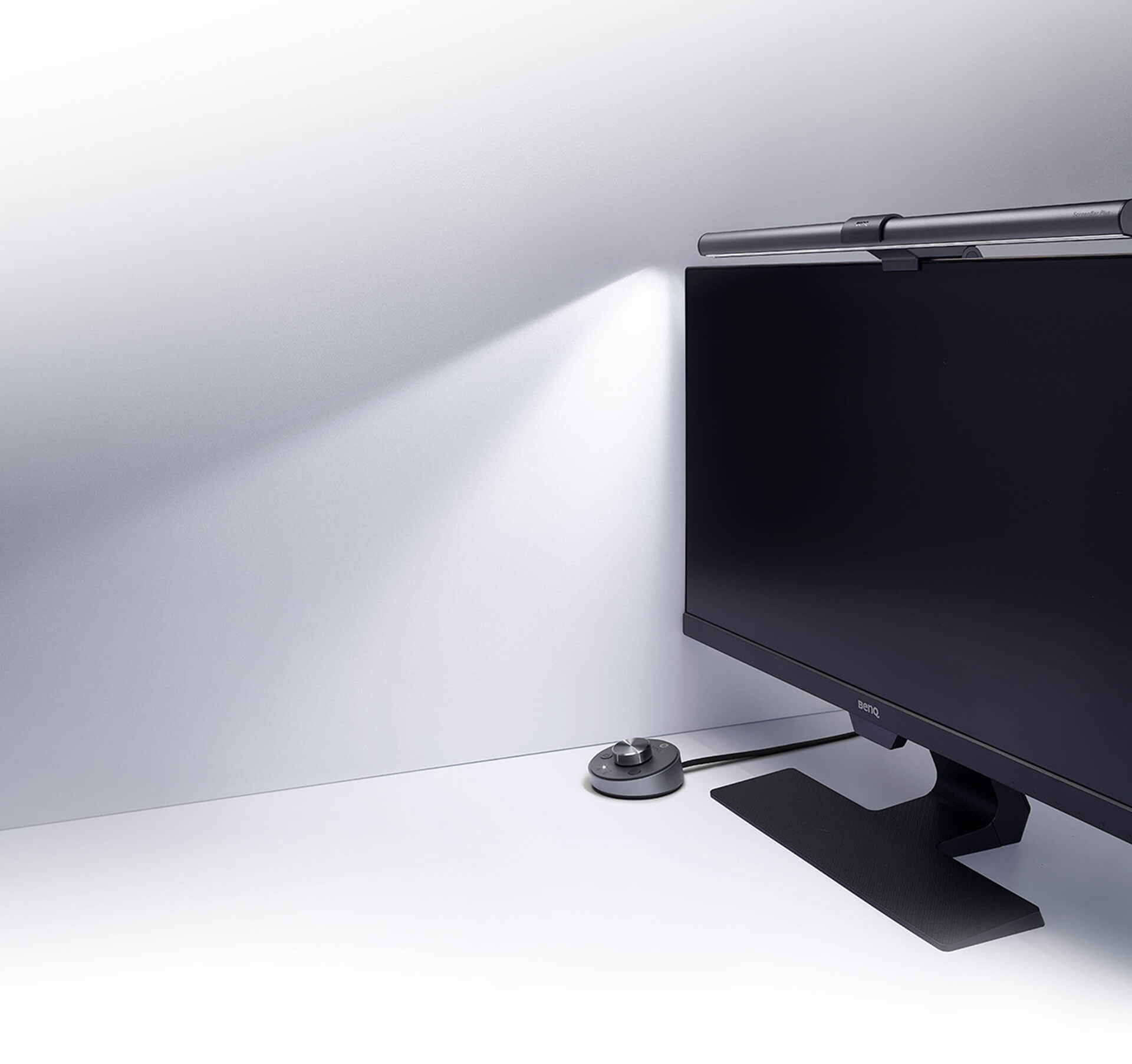 BenQ ScreenBar Plus monted on a monitor that's angled to the left
