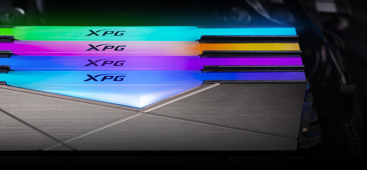 Four memory modules are illuminating in different colors.