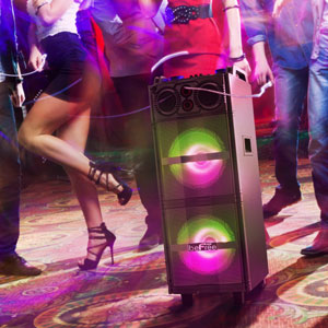 BeFree Sound BFS-5501 Party Speaker on the floor of a club with people dancing around it