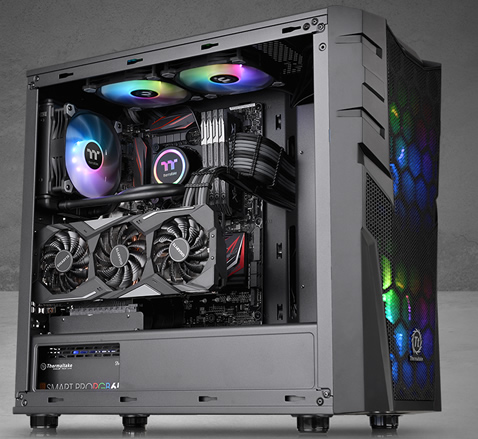 Thermaltake Commander C32 facing to the right fully loaded with components and RGB-lit fans