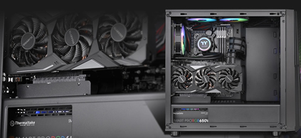 Thermaltake Commander C32 with its side panel removed and components fully installed, the background is a closeup of the case's interiors with the graphics card and power supply closest to the viewer