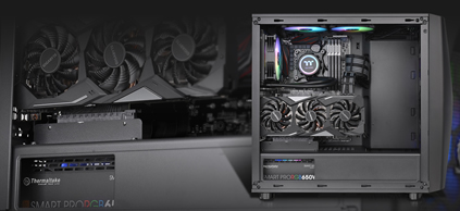 Thermaltake Commander C34 with its side panel removed and components fully installed, the background is a closeup of the case's interiors with the graphics card and power supply closest to the viewer