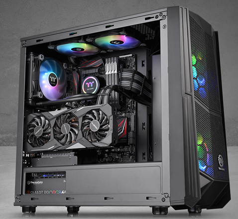 Thermaltake Commander C35 facing to the right fully loaded with components and RGB-lit fans
