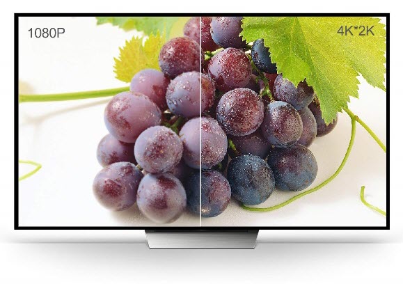 a large TV showing a grape photo to compare 1080p and 4K-2K resolutions