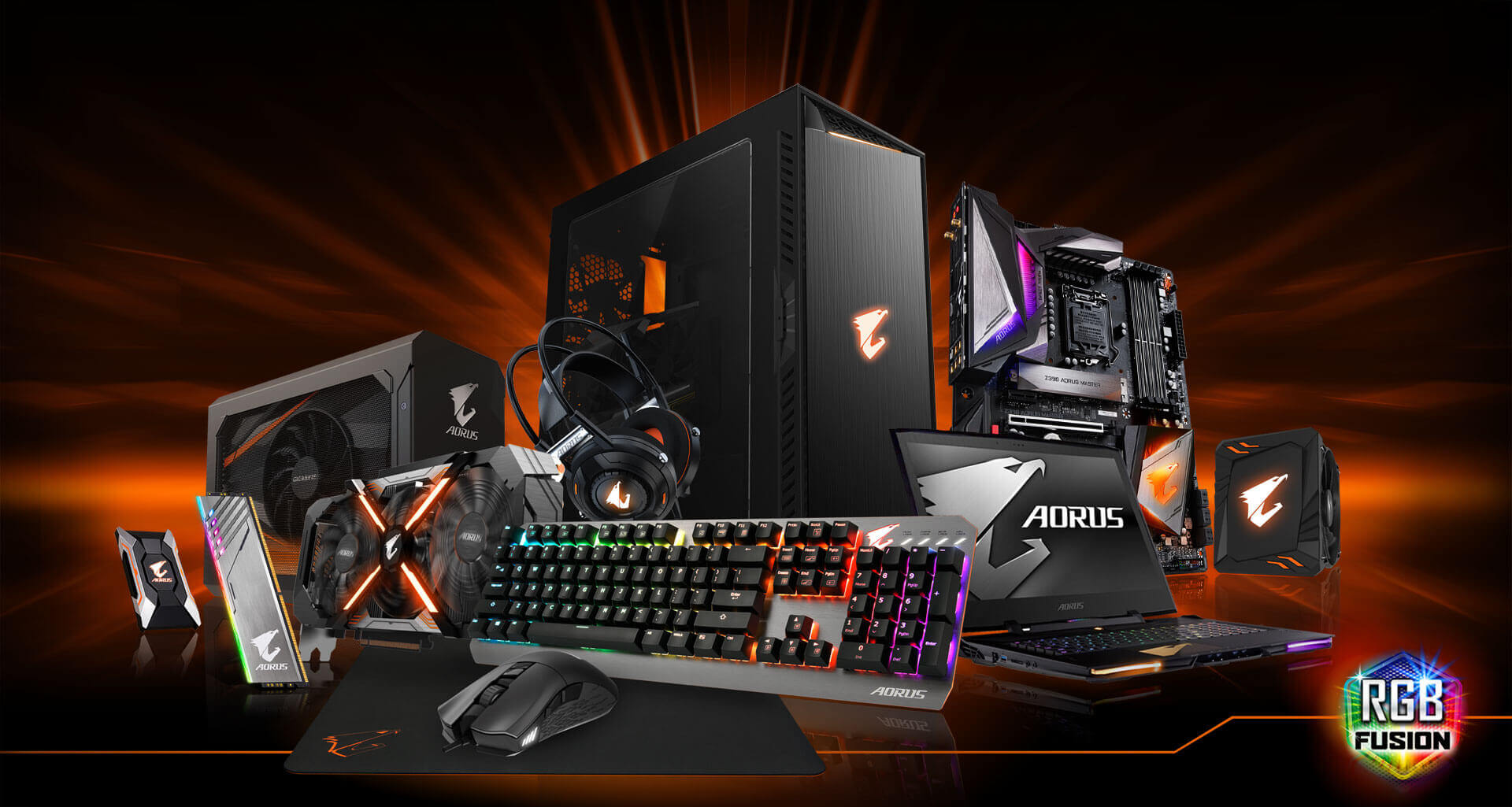 GIGABYTE Products Including: External Graphics Card, SSD, Memory, Mouse, Mouse Pad, Keyboard, Laptop, Desktop PC, Motherboard and the RGB Fusion Logo