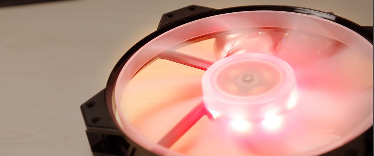 Cooler Master MF200R case fan looking up, spinning, with pink RGB lighting